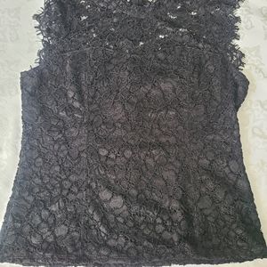 White House Black Market New without tags black lace sleeveless blouse size 10